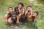 Family Swimming In A Creek, Efate, Vanuatu