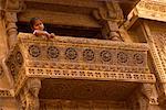 Girl Looking Over Balcony, Jaiselmer, Rajusthan, India