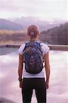 Woman Standing by Lake