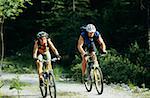 Man and woman cycling