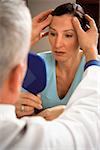 Woman preparing for face lift