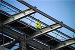 Man walking on girders