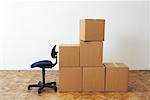 Cardboard Boxes and Office Chair