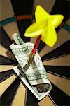 Dart Pinning Dollar Bill to Dartboard