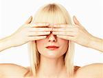 Woman Covering Eyes with Hands