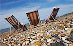 Women Sitting on Beach Chairs