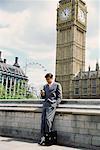 Businessman by House of Parliament, London, England