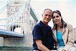 Portrait of Couple Outside of Tower Bridge, London, England