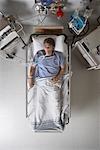 Man in Hospital Bed