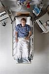 Man in Hospital Bed