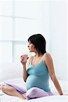 Pregnant Woman Drinking Milk Shake