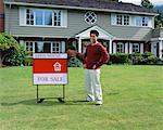 Portrait of Man Standing in Front of House