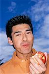 Portrait of Man Eating Apple