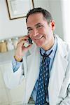Doctor Using Cellular Telephone