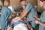 Doctors Trying to Resuscitate Patient