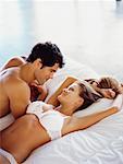 Couple Lying in Bed