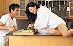 Couple Eating in Kitchen