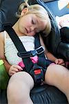 Girl Sleeping in Car Seat