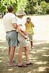 Boy Taking Photo of Grandparents