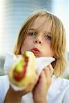 Boy Eating Hot Dog