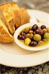 French Bread with Bowl of Olives