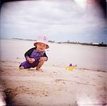 Toddler Playing on Beach, Cayman Islands, Caribbean