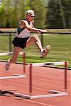 Man Jumping Hurdles