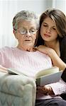 Grandmother and Granddaughter Reading Book
