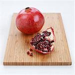 Pomegranate on Cutting Board