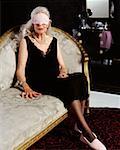 Senior woman wearing eye mask