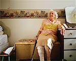 Elderly woman in her room