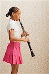 Girl playing clarinet
