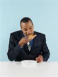 Businessman Eating Pizza Slice