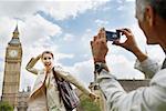 Man Taking Picture of Woman