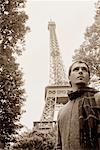 Man at Eiffel Tower, Paris, France