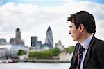 Businessman Looking over City, London, England