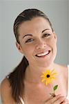 Potrait of Woman Holding a Flower