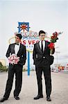 Men in Formal Wear by Sign, Las Vegas, Nevada, USA