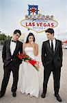 Wedding Party by Sign, Las Vegas, Nevada, USA