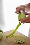 Woman Peeling Apple