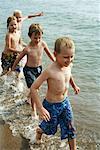 Boys Running on Beach