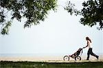 Woman Jogging with Baby