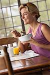 Woman Eating Breakfast