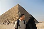 Couple Standing in Front of Pyramid, Giza, Egypt