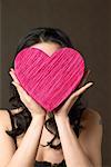 Woman Holding Heart Shaped Box