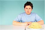 Boy with Plate of Spaghetti