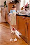 Child Looking at Broken Plate