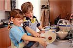 Siblings Doing Dishes