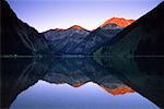 Reflection of Mountains in Lake Vilsalpsee, Tannheim, Tyrol, Austria