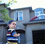 Portrait of Boy Wearing Baseball Cap Backwards - Stock Photo - Masterfile -  Rights-Managed, Artist: Dan Lim, Code: 700-00057787